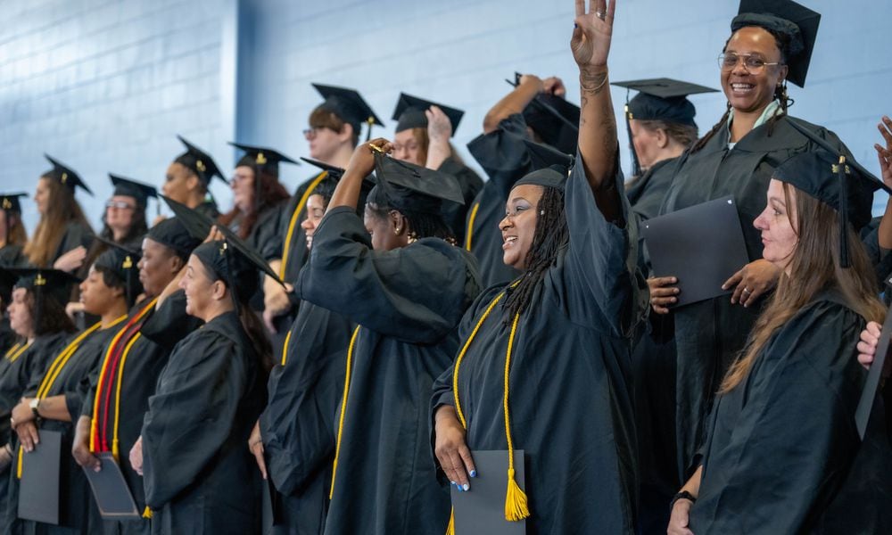 Dayton Correctional Institute women celebrate after getting their diplomas Tuesday, Oct. 1. Courtesy of Sinclair Community College