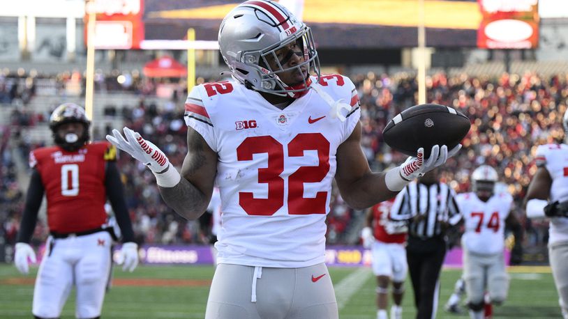 Ohio State running back TreVeyon Henderson celebrates his touchdown during the first half of an NCAA college football game against Maryland, Saturday, Nov. 19, 2022, in College Park, Md. (AP Photo/Nick Wass)