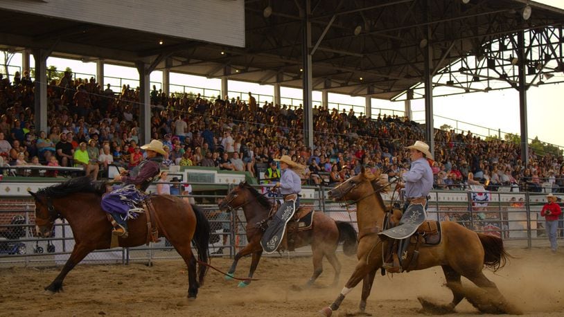 Saddle bronco riders competed at the Butler County Fair on July 23 as part of a national rodeo company. KASEY TURMAN/STAFF