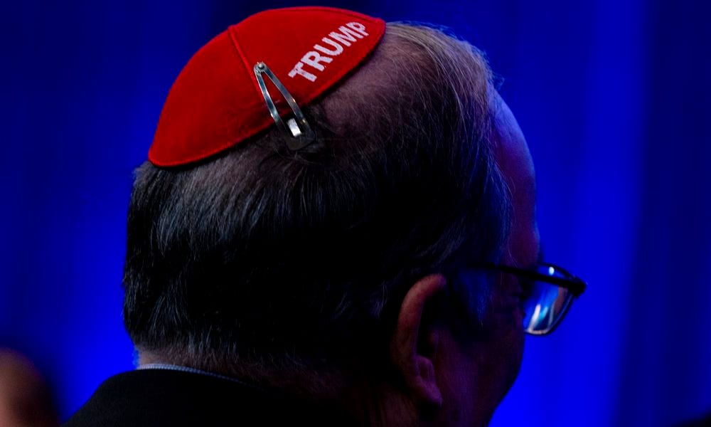 Trump supporter wears a kippah before the Republican presidential candidate former President Donald Trump speak, during a 