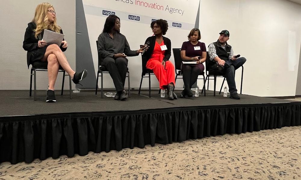 A panel spoke on the realities of small business entrepreneurship Thursday at Wright-Patterson Air Force Base's Hope Hotel. From the left: Kathi Vidal, of the U.S. Patent and Trademark Office; Charlynda Scales, CEO of Mutt's Sauce LLC; Alicia Brown, founder of Write With Mrs. Brown LLC; Lisa Coker, CEO of Infinite Management Solutions; and Nicholas Ripplinger, president of Battle Sight Technologies. THOMAS GNAU/STAFF