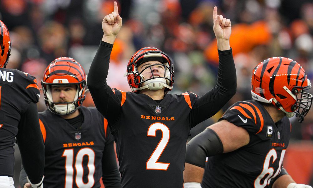 Cincinnati Bengals place kicker Evan McPherson (2) celebrates a field goal against the Cleveland Browns during the first half of an NFL football game in Cincinnati, Sunday, Jan. 7, 2024. (AP Photo/Jeff Dean)