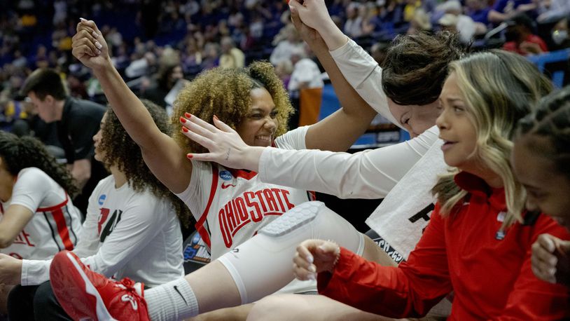 Ohio State guard Anyssa Jones (3) and forward Rebeka Mikulasikova (23) celebrate as their team takes the lead against Missouri State late in the fourth period of a women's college basketball game in the first round of the NCAA tournament, Saturday, March 19, 2022, in Baton Rouge, La. (AP Photo/Matthew Hinton)