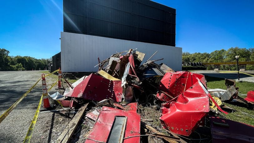 The iconic Dixie Twin Drive-In sign was damaged recently, toppling to the ground after strong winds and storms - remnants of Hurricane Helene - tore through the area last weekend. Some pieces of the sign were salvaged as keepsakes before the remaining metal was compacted and disposed. JIM NOELKER/STAFF