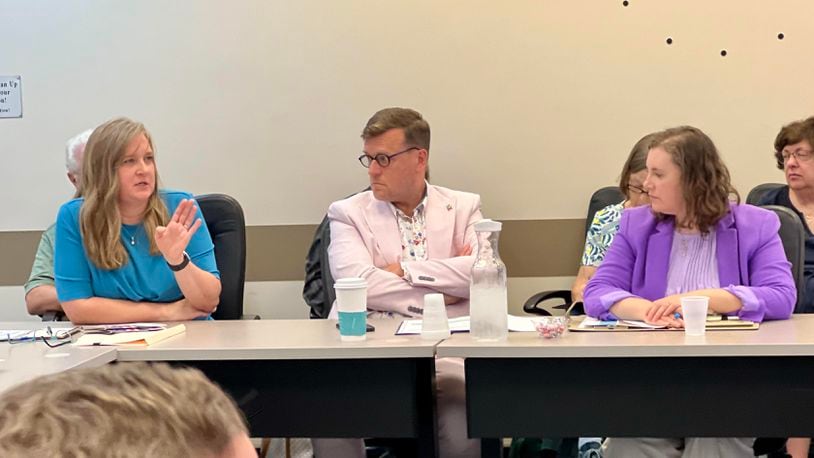 Centerville-Washington Twp. Public Library Director Liz Fultz, left, addresses the Montgomery County Budget Commission on Aug. 29, 2024. To her right are Dayton Metro Library representatives Director Jeffrey Trzeciak and Fiscal Officer Hilary Browning. AIMEE HANCOCK/STAFF