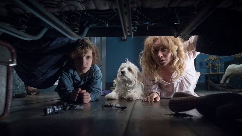 This image released by IFC Films shows Noah Wiseman, left, and Essie Davis in a scene from the film "The Babadook." (IFC Films via AP)