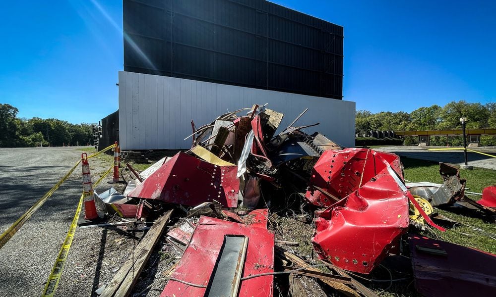 The iconic Dixie Twin Drive-Inn sign was damaged recently, toppling to the ground after strong winds and storms - remnants of Hurricane Helene - tore through the area last weekend. JIM NOELKER/STAFF