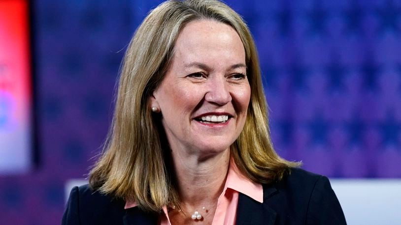 FILE - Kris Mayes smiles before a debate on Sept. 28, 2022, in Phoenix. (AP Photo/Ross D. Franklin, File)