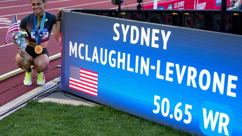 Sydney McLaughlin-Levrone poses for a photo after winning the women's 400-meter hurdles final during the U.S. Track and Field Olympic Team Trials, Sunday, June 30, 2024, in Eugene, Ore. (AP Photo/Charlie Neibergall)