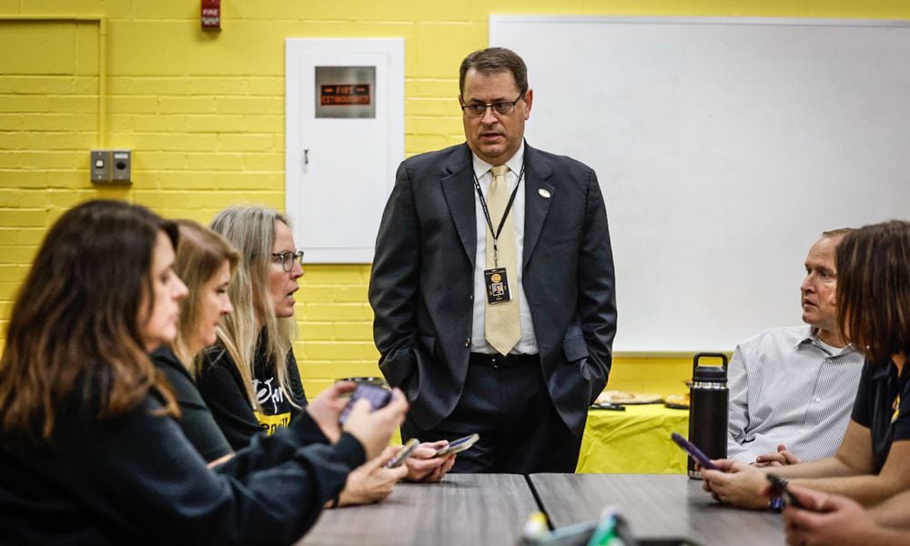 Centerville schools Superintendent Jon Wesney talks to district administrators during a Nov. 7, 2023 election watch party. In the Dayton area, Centerville City Schools had the second-highest number of students living in the district and attending private schools on vouchers this past school year, according to the Ohio Department of Education and Workforce data. Jim Noelker/Staff