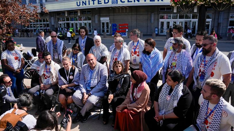 Uncommitted delegates hold a press conference outside the United Center before the Democratic National Convention Thursday, Aug. 22, 2024, in Chicago. (AP Photo/Matt Rourke)