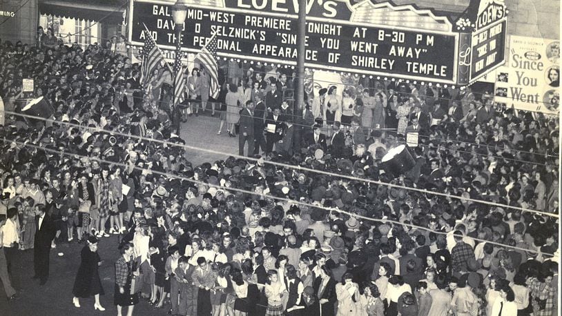 A crowd fills the sidewalk outside the old Loew's Theater on Main Street in Dayton. The marquee lists a showing of "Since You Went Away," which was released in 1944, and a personal appearance by Shirley Temple, who had a role in the movie.