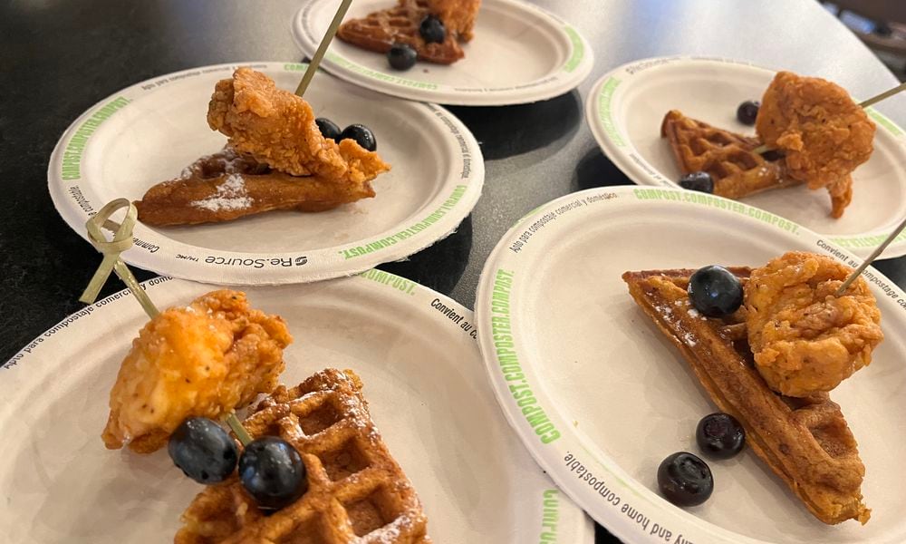 W. Social Tap & Table in Daytons historic Wright-Dunbar District is offering Saturday brunch from 10 a.m. to 2 p.m. starting March 9. Pictured is a sweet potato waffle with chicken from De'Lish. NATALIE JONES/STAFF