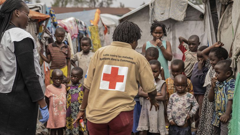 Red Cross officials create awareness around mpox in the Don Bosco refugee camp in Goma, Democratic Republic of Congo, Thursday, Aug. 22, 2023. (AP Photo/Moses Sawasawa)