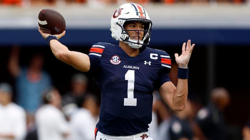 Auburn quarterback Payton Thorne looks to throw a pass during the second half of an NCAA college football game against California, Saturday, Sept. 7, 2024, in Auburn, Ala. (AP Photo/Butch Dill)