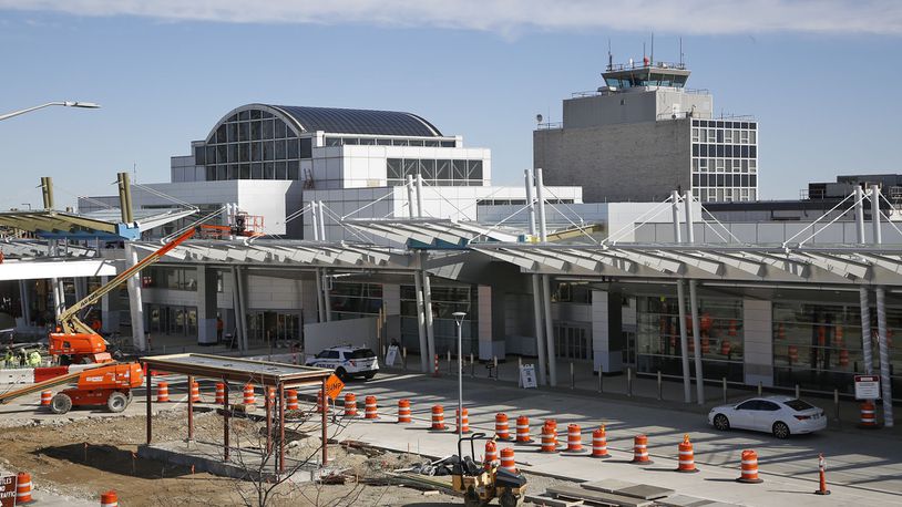 Renovation to the Dayton Airport terminal has been continues with new terrazzo floors and a full glass and steel exterior with a glass canopy to bring more natural light into the terminal. TY GREENLEES / STAFF