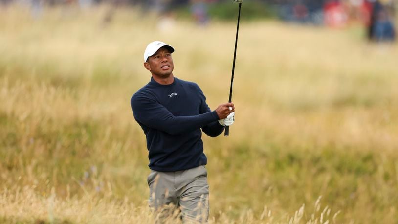 FILE - Tiger Woods of the United States plays from the rough on the sixth hole during his second round of the British Open Golf Championships at Royal Troon golf club in Troon, Scotland, July 19, 2024. (AP Photo/Peter Morrison, File)