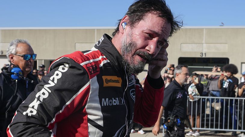 Keanu Reeves drives during the GR Cup Series auto race at Indianapolis Motor Speedway, Saturday, Oct. 5, 2024, in Indianapolis. (AP Photo/Darron Cummings)