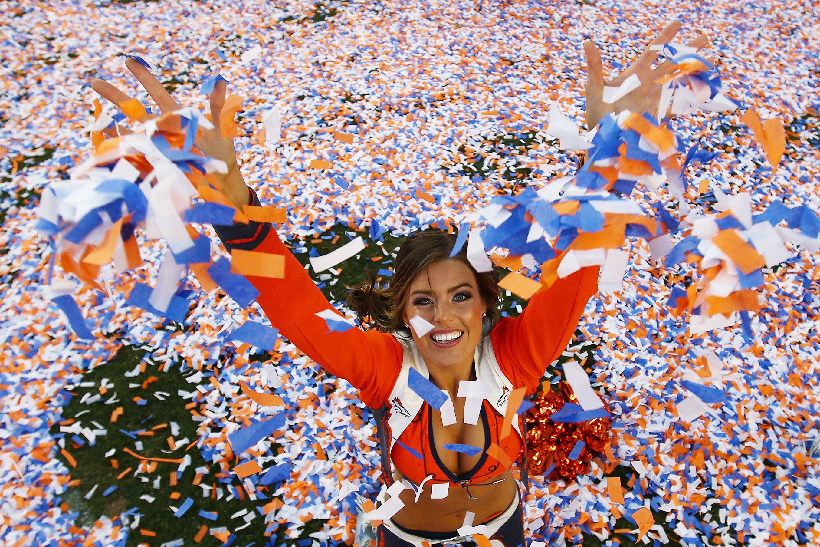 The Denver Broncos cheerleaders perform at Sports Authority Field