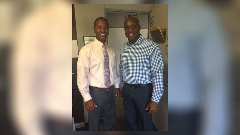 Former Middletown Schools’ Rosa Parks Elementary Principal Bryan Cannon (right) - pictured with Middletown Schools Superintendent Marlon Styles Jr. - has left the district under resignation agreement but district officials are not saying why. Under the agreement obtained by the Journal-News, Cannon continues to be paid almost half of his annual $95,500 salary though he is no longer employed by the school system.