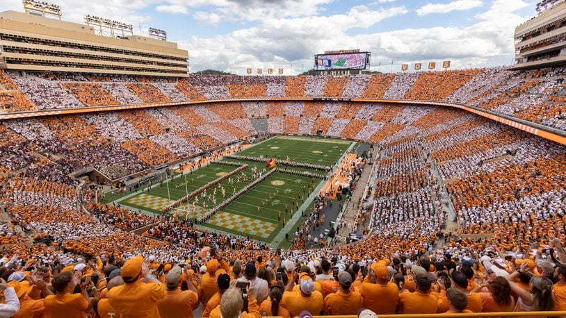 FILE - Tennessee players run onto the field at Neyland Stadium before an NCAA college football game between Tennessee and Texas A&M Saturday, Oct. 14, 2023, in Knoxville, Tenn. (AP Photo/Wade Payne, File)