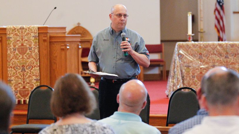 Jeff Jordan, Montgomery County’s emergency management director, will open the county’s Emergency Operations Center for the fifth time in 13 months, now to combat the coronavirus pandemic. Here Jordan talks to a group about long-term tornado recovery efforts in Trotwood on June 19, 2019. CHRIS STEWART / STAFF