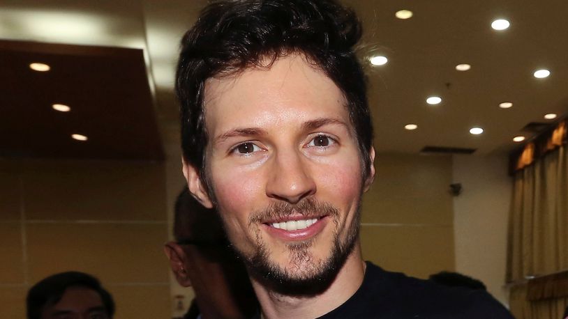 FILE - Telegram co-founder Pavel Durov, center, smiles following his meeting with Indonesian Communication and Information Minister Rudiantara in Jakarta, Indonesia on Aug. 1, 2017. (AP Photo/Tatan Syuflana, File)