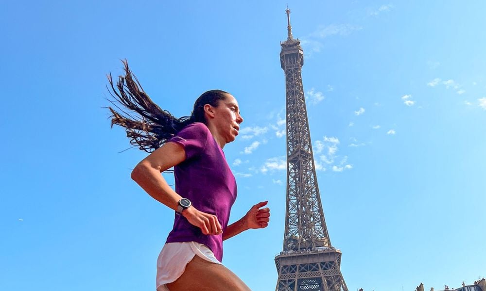 Grace Norman on a training run in front of the Eiffel Tower at a Paralympic test event in Paris last year. CONTRIBUTED