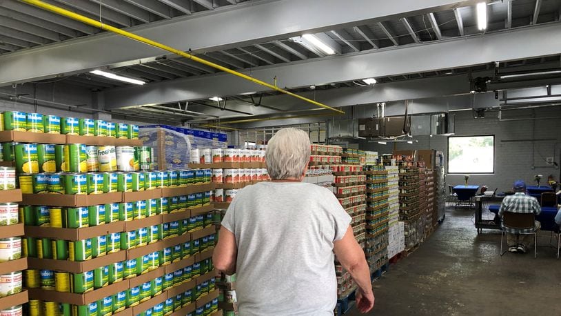 The Xenia FISH Food Pantry welcomed community members to its new location on Cincinnati Avenue in Xenia. STAFF/BONNIE MEIBERS