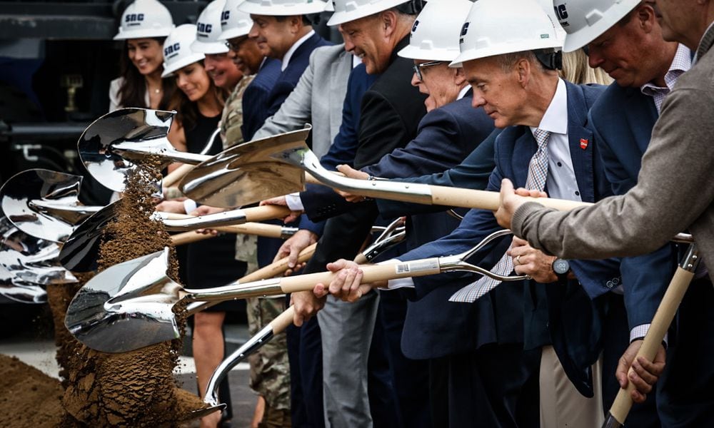 Sierra Nevada Corp. celebrated the opening of it's new 100,000-square-foot aircraft maintenance hanger and the groundbreaking of two other slightly larger hangers that will be built near the Dayton International Airport. JIM NOELKER/STAFF