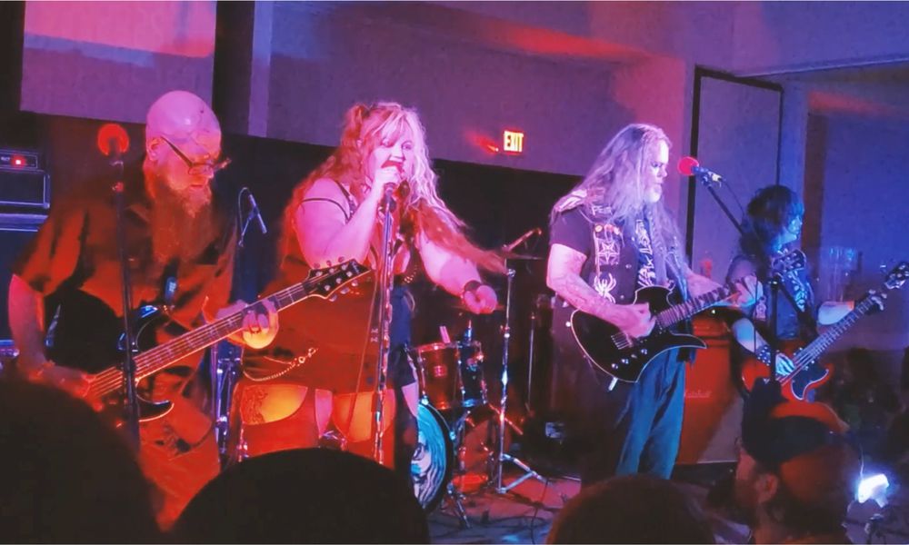 Dayton-based horror punks the Creepy Crawlers, (left to right) Gory Cory, Scarika Watson, Danny Grim, Rev. Chad Wells and P.J. Wells, play its first hometown show at Cosmic Joes Atomic Lounge in Dayton on Friday.