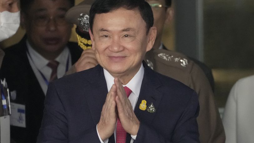 FILE - Thailand's former Prime Minister Thaksin Shinawatra arrives at Don Muang airport in Bangkok, Thailand, Aug. 22, 2023. Thai prosecutors said Thaksin was formally indicted Tuesday, June 18, 2024, on a charge of defaming Thailand's monarchy in one of several court cases that have unsteadied Thai politics. (AP Photo/Sakchai Lalit, File)