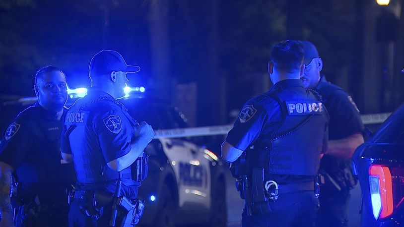 This image provided by WBMA shows police working on the scene of a shooting in Birmingham, Ala., Sunday, Sept. 22, 2024. (Bill Castle/WBMA via AP)