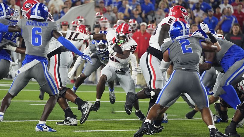 Georgia running back Branson Robinson (22) runs for a touchdown during the second half of an NCAA college football game against Kentucky, Saturday, Sept. 14, 2024, in Lexington, Ky. (AP Photo/Darron Cummings)