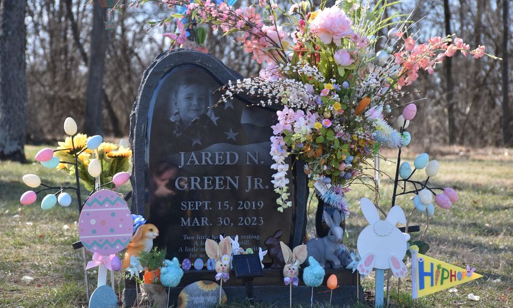 The headstone of Jared Green Jr., a 3-year-old boy who accidentally shot himself with a gun that belonged to Benjamin Bishop, the boyfriend of his mother. Jared is buried at a Rose Hill Burial Park, a cemetery in Hamilton, Ohio. CORNELIUS FROLIK / STAFF