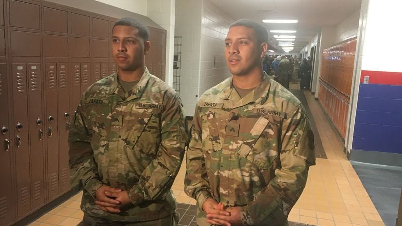 John (left) and Alberto Zapata, both current students at the University of Akron and Hamilton High School grads, are corporals and soon-to-be moving up the ranks to sergeant. The 22-year-old identical twins are looking forward to being deployed. They volunteered from a different guard unit to join the 1487th’s mission. STAFF