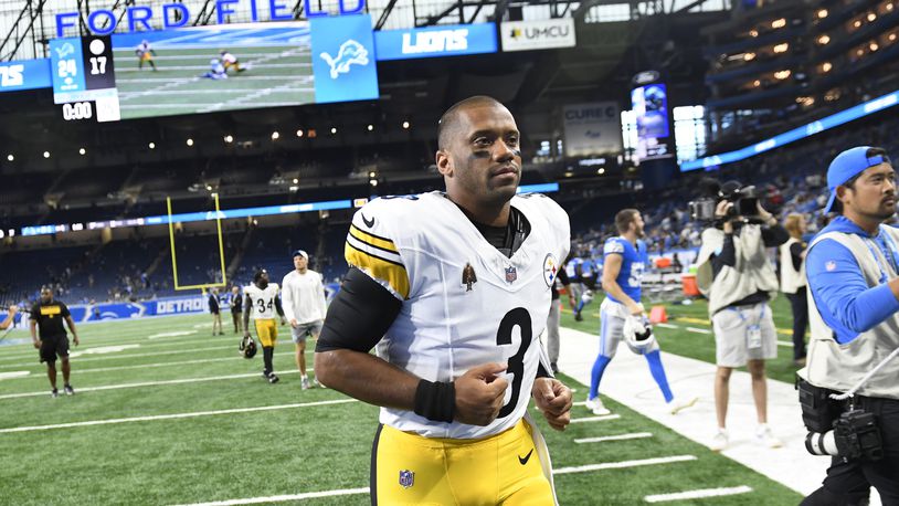 Pittsburgh Steelers quarterback Russell Wilson runs off the field after the second half of an NFL preseason football game against the Detroit Lions, Saturday, Aug. 24, 2024, in Detroit. (AP Photo/Jose Juarez)