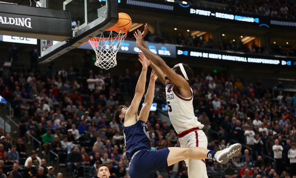 Dayton's DaRon Holmes II scores in the final minutes of the second half against Nevada in the first round of the NCAA tournament on Thursday, March 21, 2024, at the Delta Center in Salt Lake City, Utah. David Jablonski/Staff