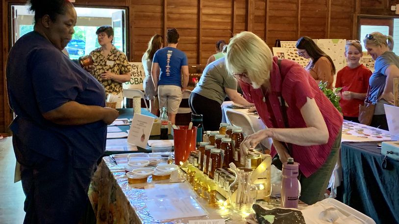 The Greene County Beekeepers Association Honey Harvest, held June 15, aims to raise awareness of beekeeping and native plants. LONDON BISHOP/STAFF