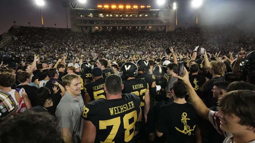 Vanderbilt celebrates the team's 40-35 win against Alabama on the field after an NCAA college football game Saturday, Oct. 5, 2024, in Nashville, Tenn. (AP Photo/George Walker IV)