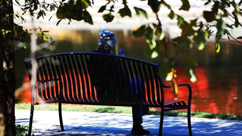 As the days grow shorter and the air gets cooler, Mother Nature has started pulling back the blanket of green foliage to reveal the bright reds, yellows, oranges and browns of autumn at Lincoln Park in Kettering. MARSHALL GORBY\STAFF