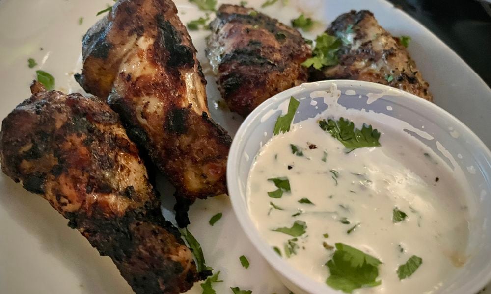 Char-Grilled Hot Wings from Pies & Pints at The Greene in Beavercreek. NATALIE JONES/STAFF