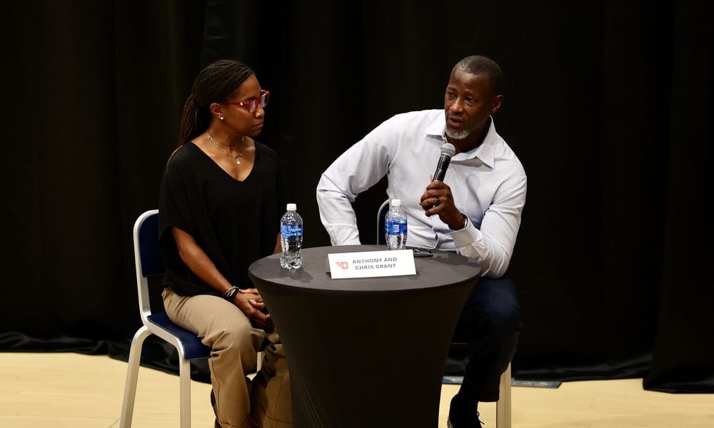 Chris Grant and Dayton coach Anthony Grant participate in 