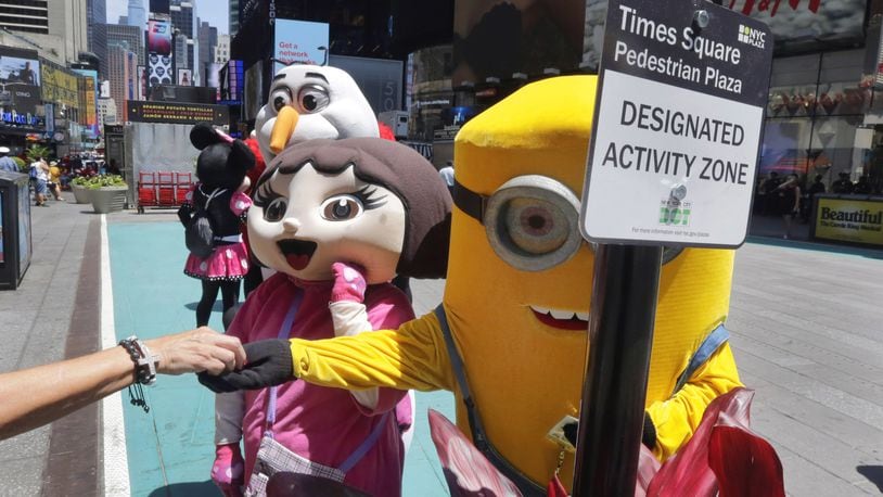 Times Square's 'creepy' costumed characters are out of control