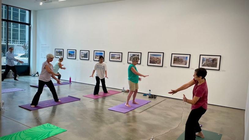 As part of the Dayton Arcade’s arts and wellness summer series, Leslie Dworkin is teaching Qigong on Thursdays at The Contemporary Dayton. NATALIE JONES/STAFF