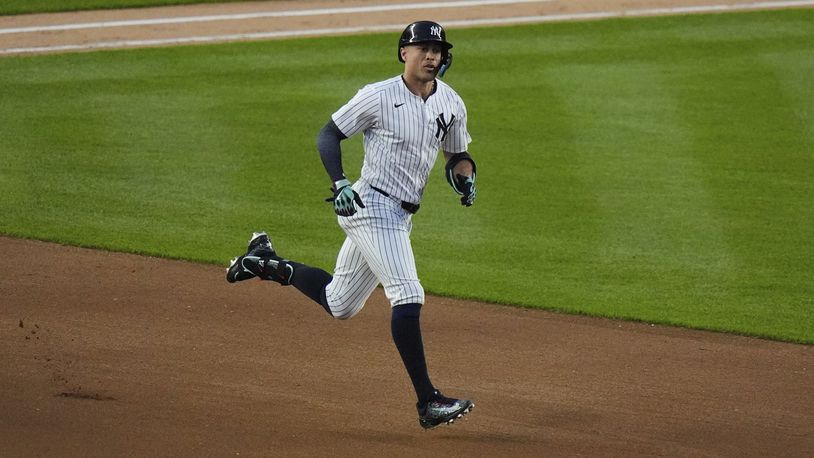 New York Yankees' Giancarlo Stanton runs to second base for a double during the fourth inning of a baseball game against the Atlanta Braves, Saturday, June 22, 2024, in New York. (AP Photo/Frank Franklin II)