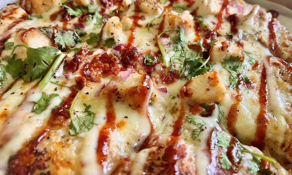 Pictured is the Smokehouse BBQ Chicken Pizza from RFFG Marketplace on North Main Street in Dayton. NATALIE JONES/STAFF