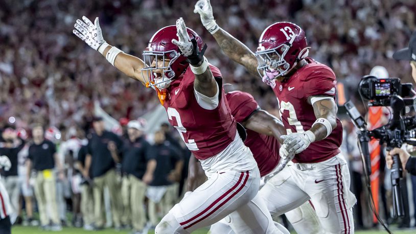 Alabama defensive back Zabien Brown (2) celebrates his game-clinching interception with Alabama defensive back Malachi Moore (13) during the second half of an NCAA college football game against Georgia, Saturday, Sept. 28, 2024, in Tuscaloosa, Ala. (AP Photo/Vasha Hunt)