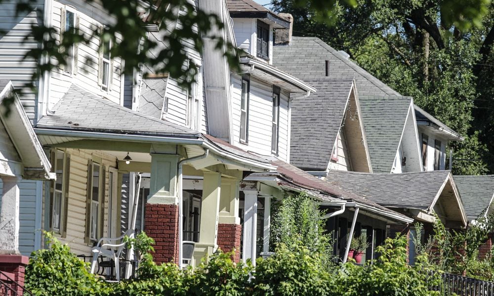 Property values in Dayton and Montgomery County are going up including these homes on Huron Ave. in Dayton.JIM NOELKER/STAFF