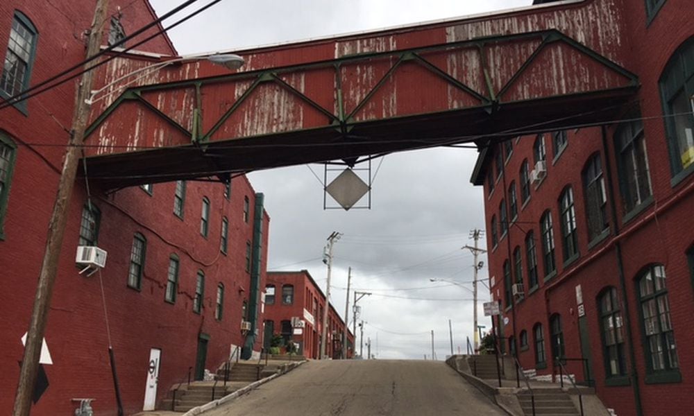 A connecting structure between two of the buildings in the Front Street complex, above East Second Street. The Dayton-Montgomery County Port Authority approved PACE program financing for this site in 2017. THOMAS GNAU/STAFF